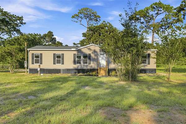 2.5 Acres of Land with Home for Sale in Spring Hill, Florida