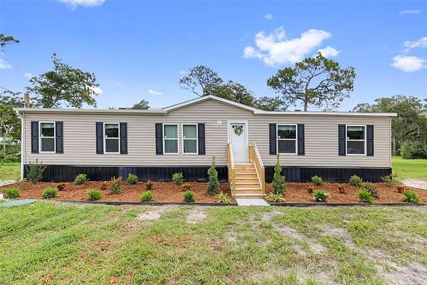 2.5 Acres of Land with Home for Sale in Spring Hill, Florida