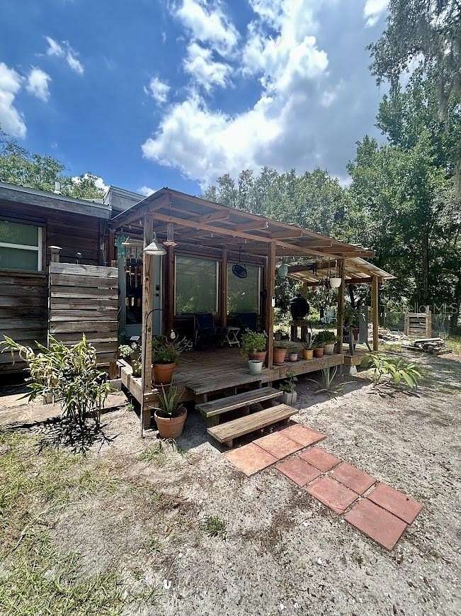 6.56 Acres of Land with Home for Sale in Wimauma, Florida
