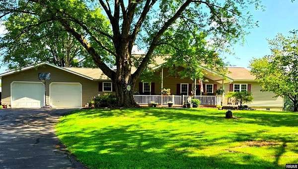 10.1 Acres of Land with Home for Sale in Dresden, Tennessee