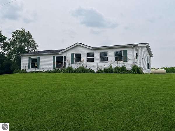 2.8 Acres of Land with Home for Sale in Clare, Michigan