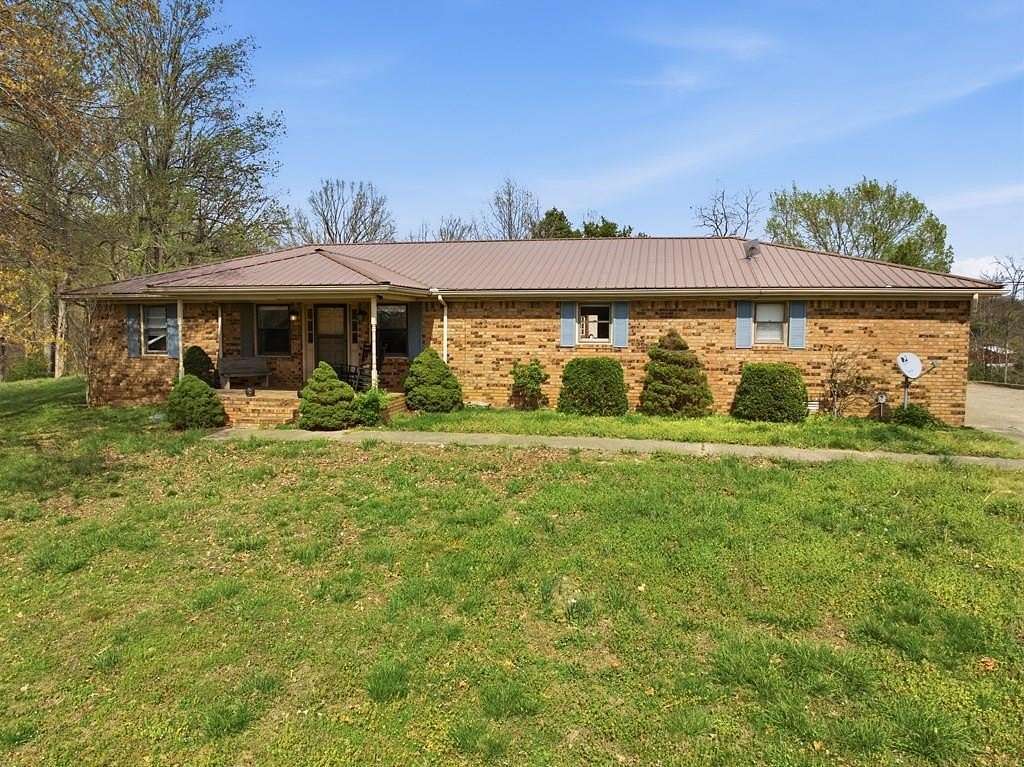 10.7 Acres of Recreational Land with Home for Sale in Nortonville, Kentucky