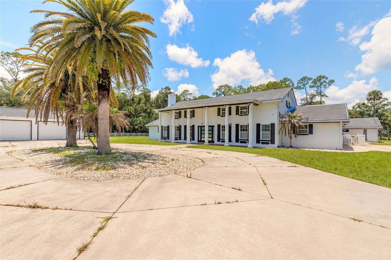 5 Acres of Land with Home for Auction in Port Orange, Florida