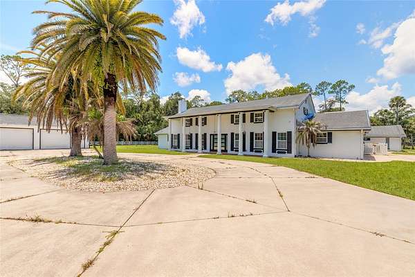 5 Acres of Land with Home for Auction in Port Orange, Florida