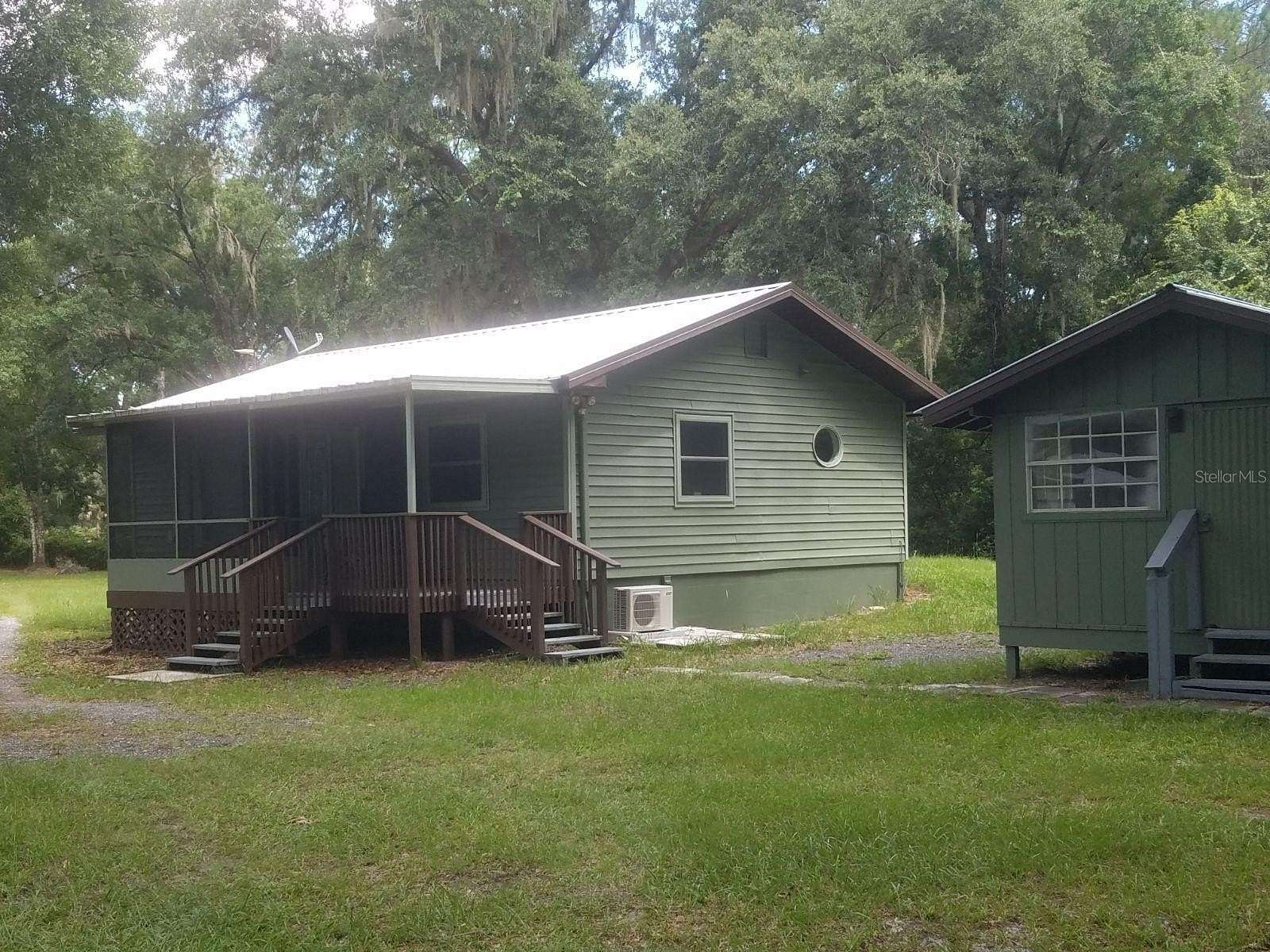 5.78 Acres of Land with Home for Sale in Umatilla, Florida