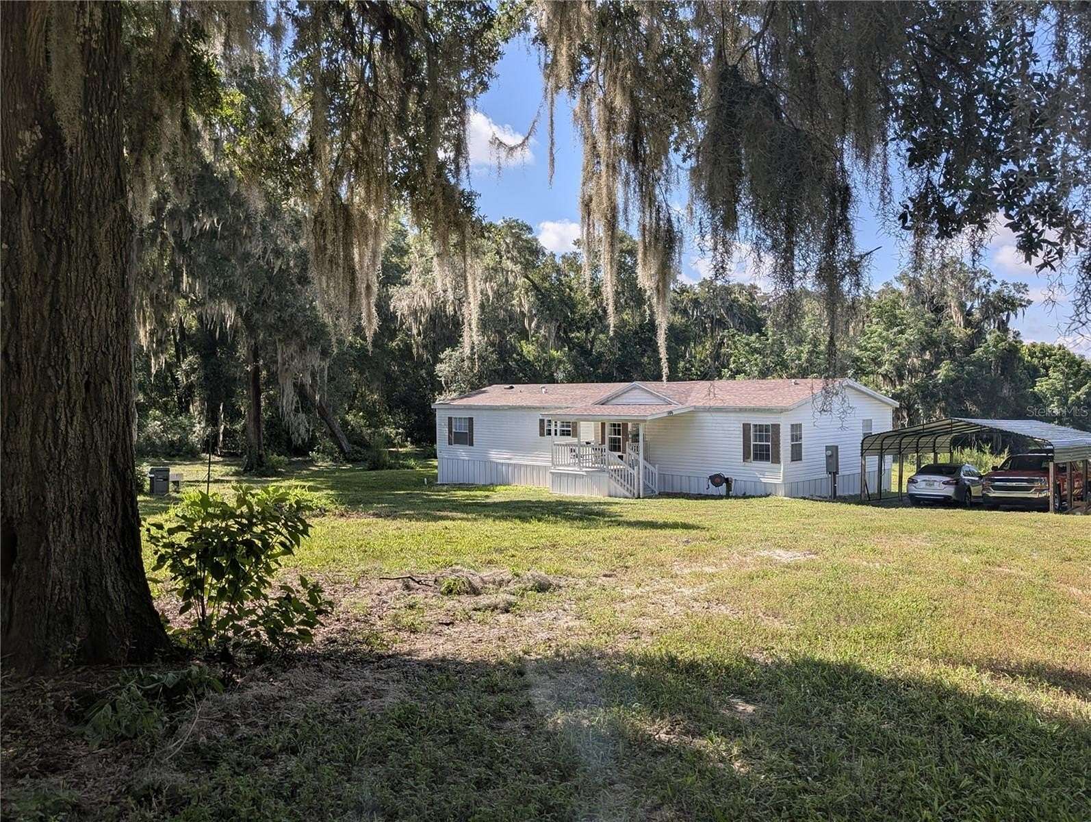 5.17 Acres of Land with Home for Sale in Crescent City, Florida