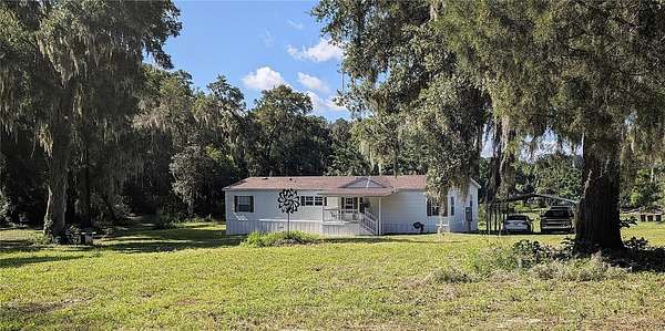 5.17 Acres of Land with Home for Sale in Crescent City, Florida