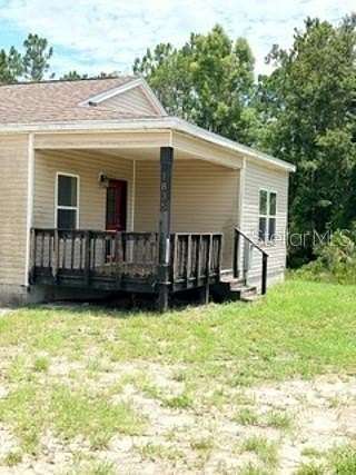 2.5 Acres of Land with Home for Sale in Deltona, Florida