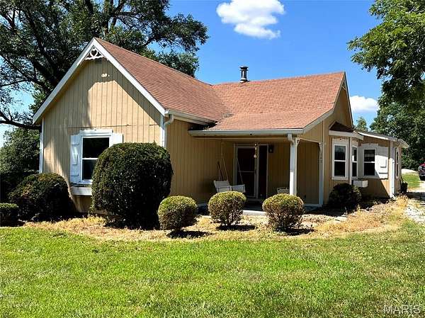 6.5 Acres of Land with Home for Auction in Troy, Missouri