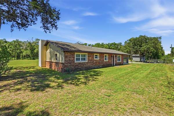 2 Acres of Land with Home for Sale in Spring Hill, Florida