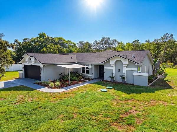 4.8 Acres of Land with Home for Sale in Hudson, Florida