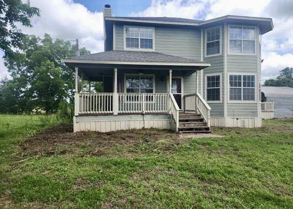 2.65 Acres of Land with Home for Sale in Carthage, Texas