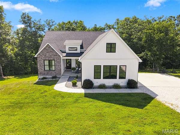 3.89 Acres of Land with Home for Sale in Clark Township, Missouri