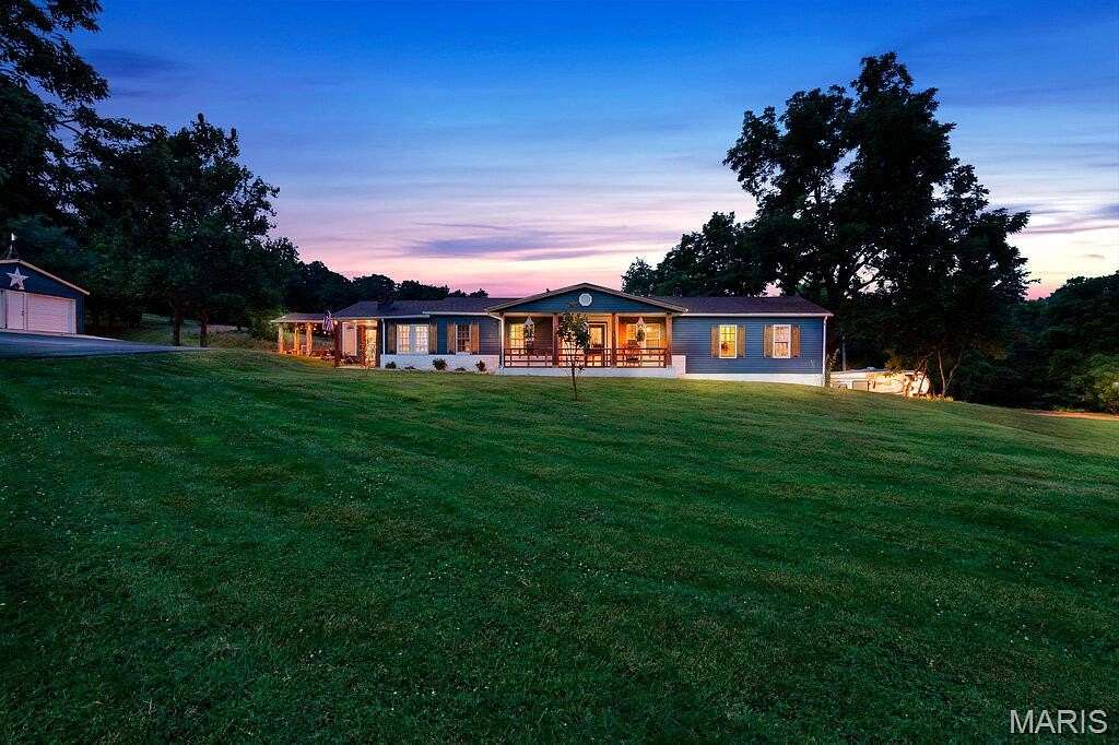 8.3 Acres of Land with Home for Sale in De Soto, Missouri