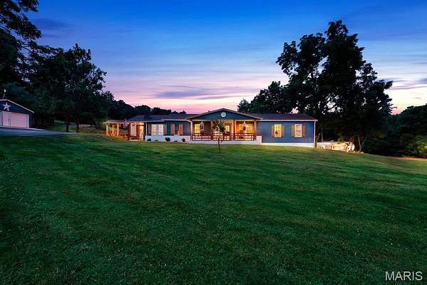 8.3 Acres of Land with Home for Sale in De Soto, Missouri