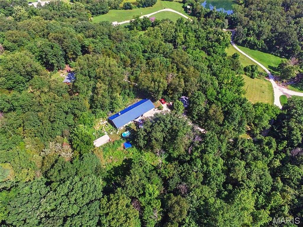 5.48 Acres of Land with Home for Sale in Pacific, Missouri
