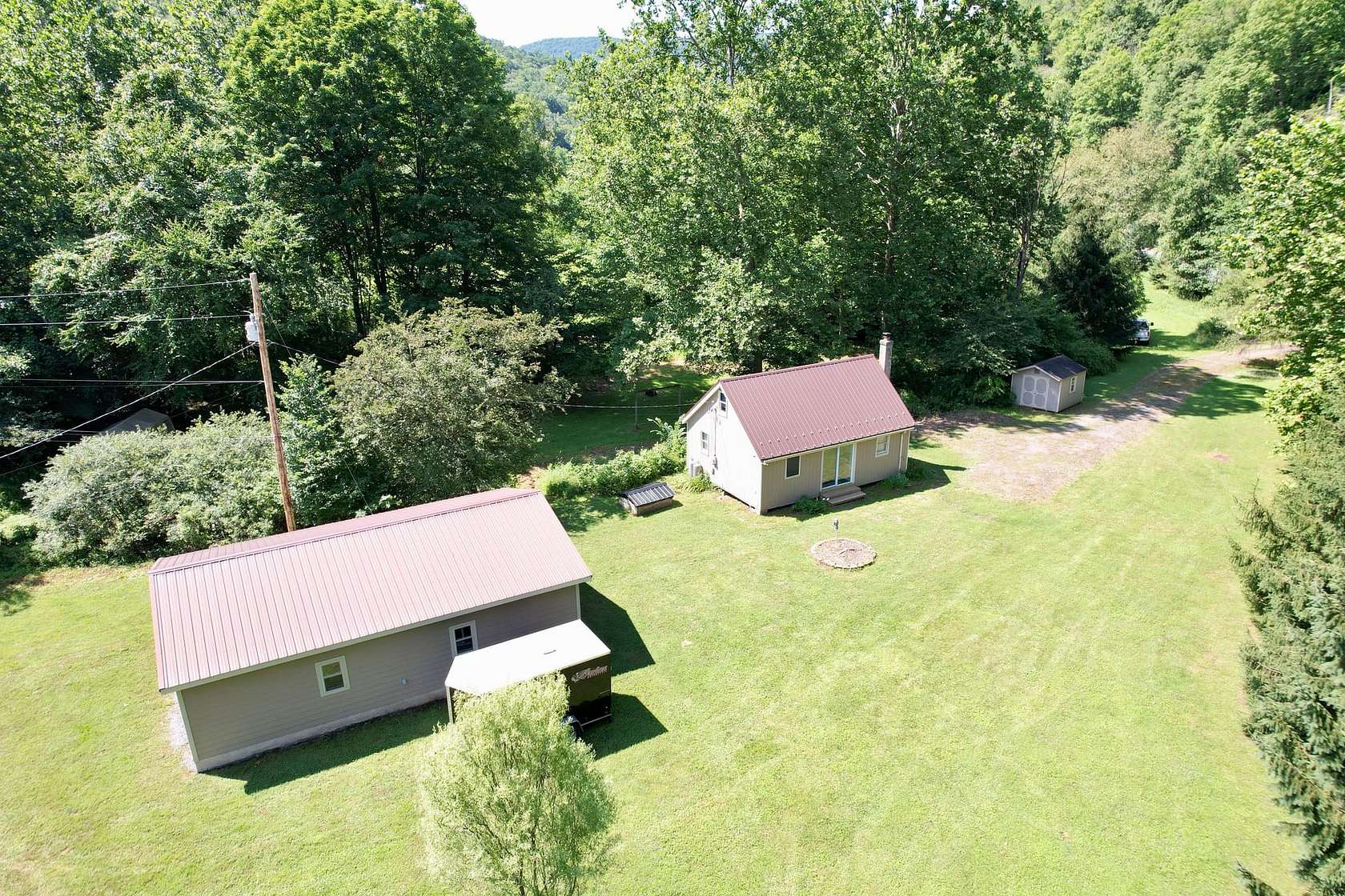 15.4 Acres of Recreational Land with Home for Sale in Austin, Pennsylvania