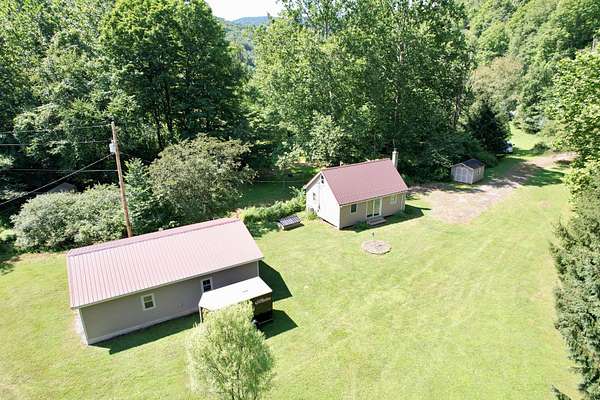 15.4 Acres of Recreational Land with Home for Sale in Austin, Pennsylvania