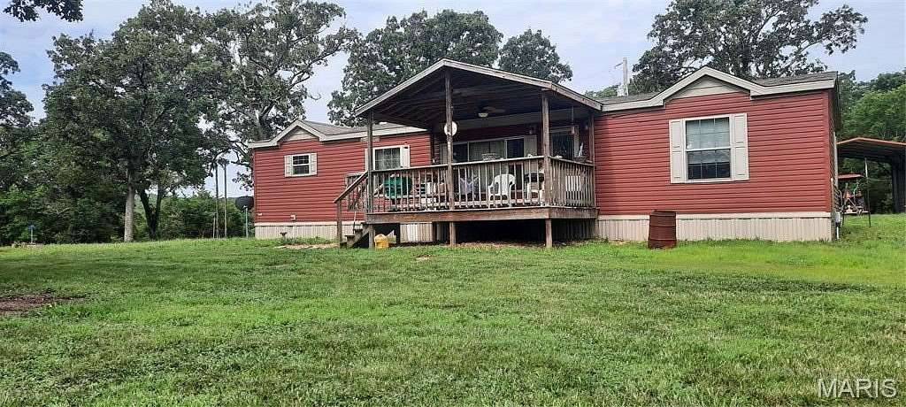 6.6 Acres of Land with Home for Sale in Salem, Missouri