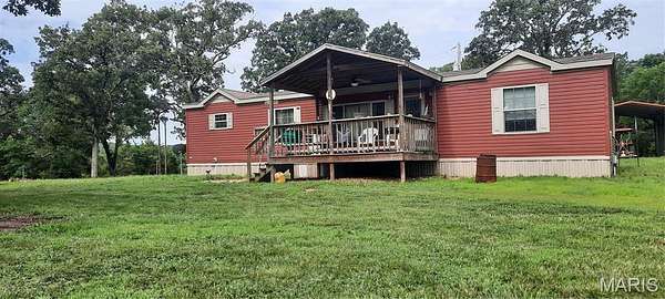 6.6 Acres of Land with Home for Sale in Salem, Missouri