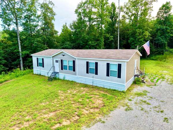 4.8 Acres of Land with Home for Sale in Lynn, Alabama