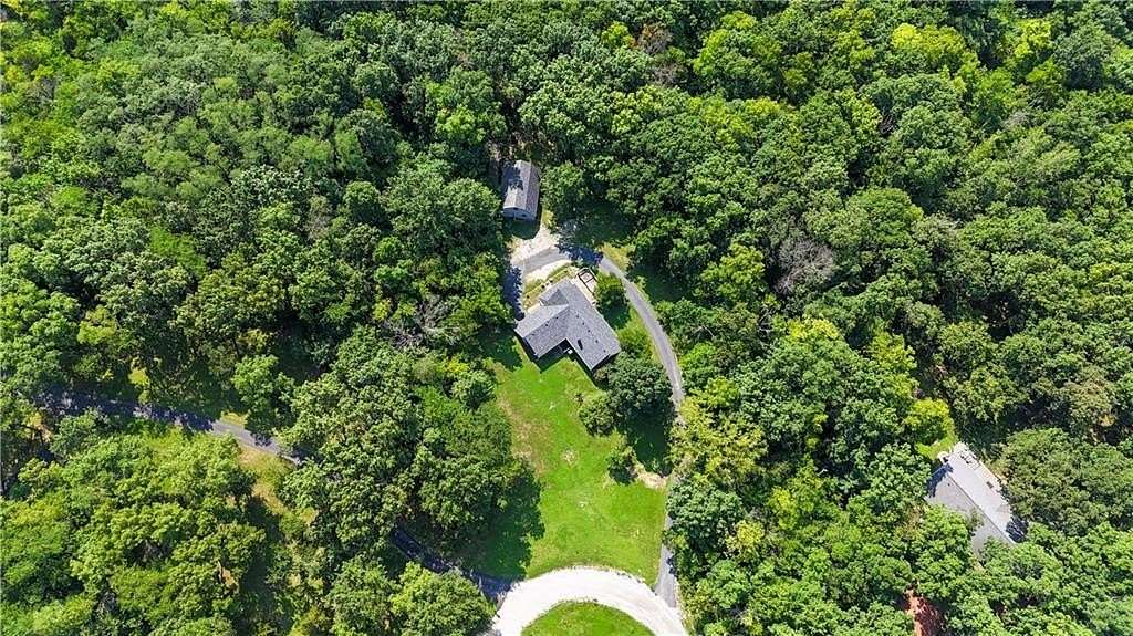 4.88 Acres of Land with Home for Sale in Holt, Missouri
