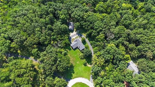 4.88 Acres of Land with Home for Sale in Holt, Missouri
