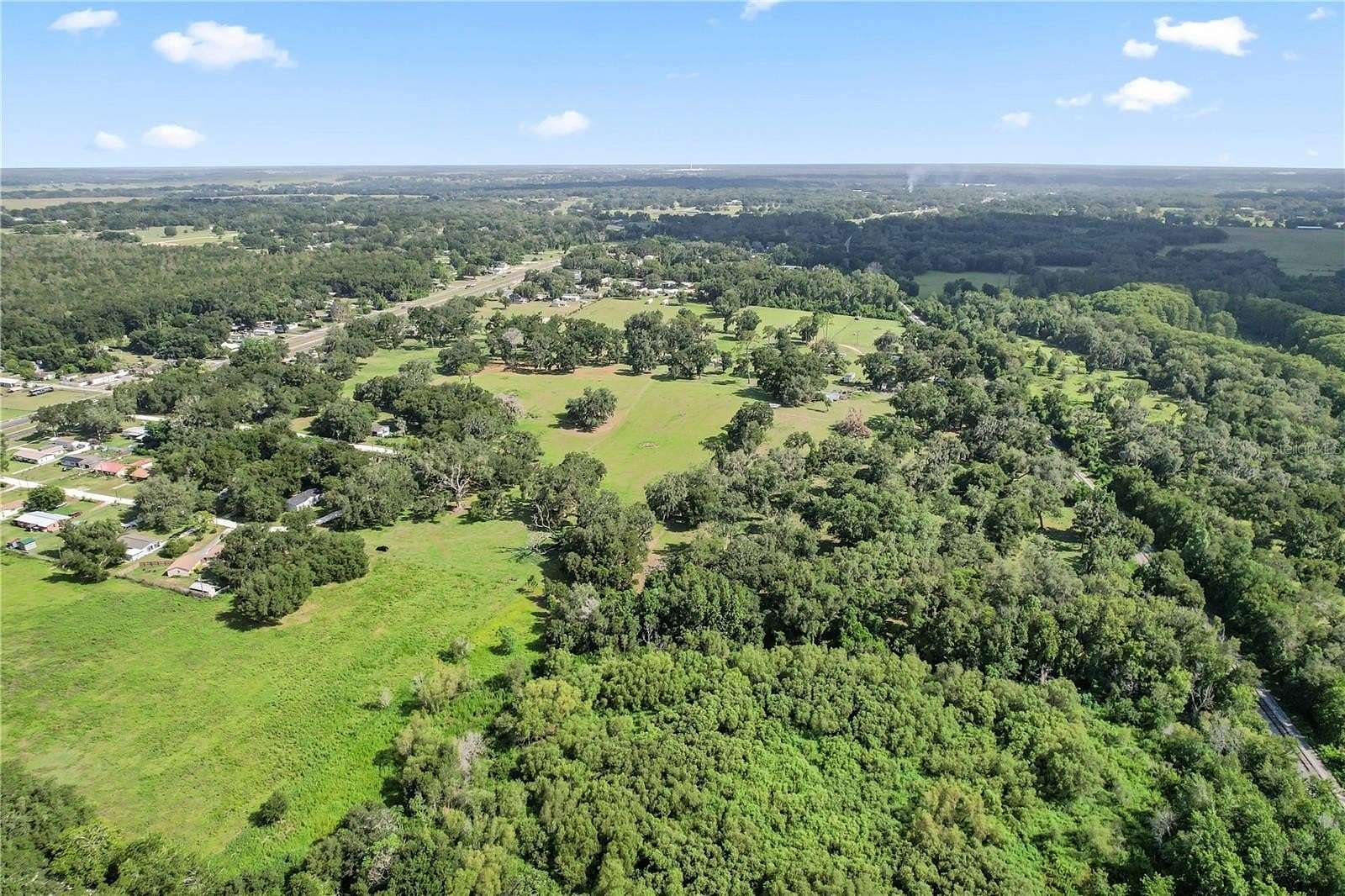 17.7 Acres of Land with Home for Sale in Dade City, Florida
