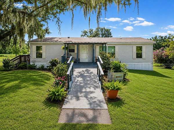 2.77 Acres of Land with Home for Sale in Land O' Lakes, Florida