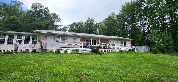 3.72 Acres of Land with Home for Sale in Coalmont, Tennessee
