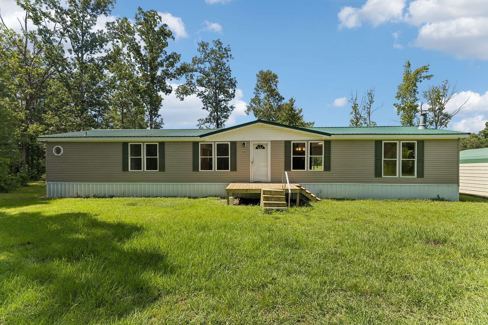1.5 Acres of Land with Home for Sale in Hohenwald, Tennessee