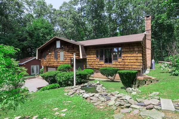 1.5 Acres of Land with Home for Sale in Huntington, New York