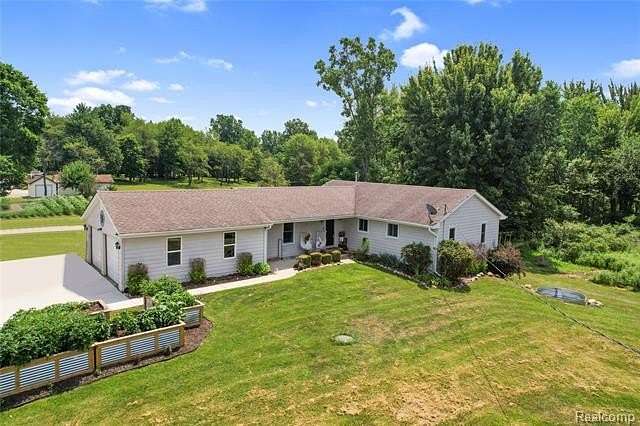 5 Acres of Land with Home for Sale in Oceola Township, Michigan