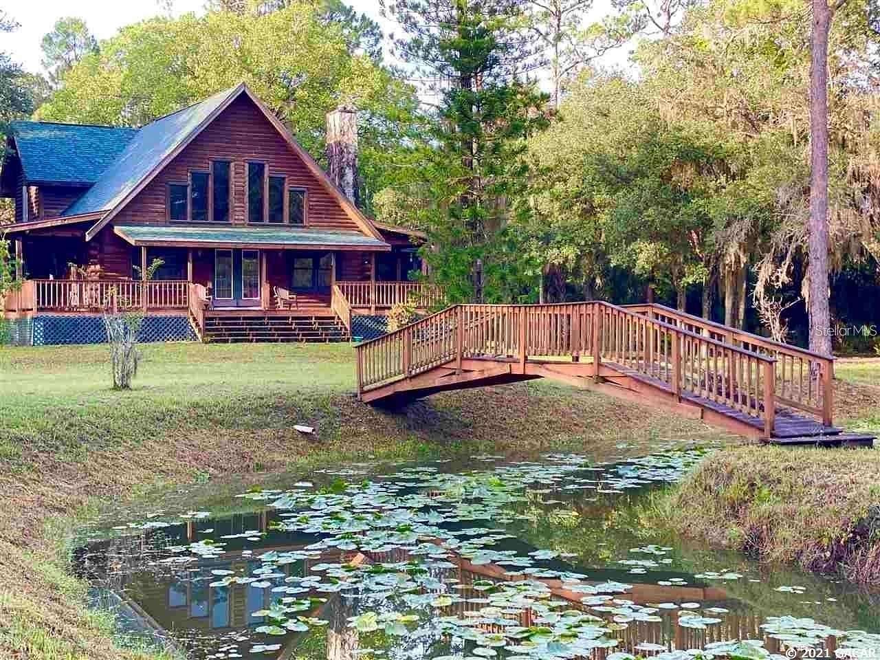 10 Acres of Recreational Land with Home for Sale in Mims, Florida