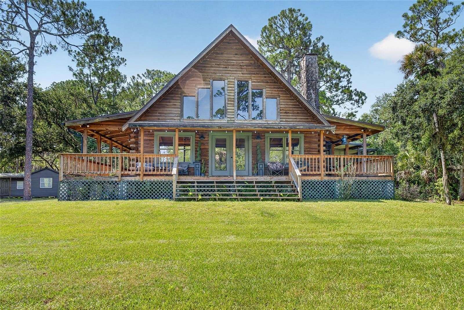 10 Acres of Recreational Land with Home for Sale in Mims, Florida