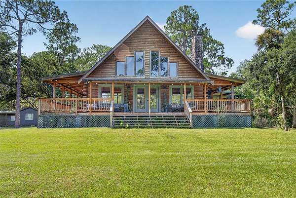 10 Acres of Recreational Land with Home for Sale in Mims, Florida