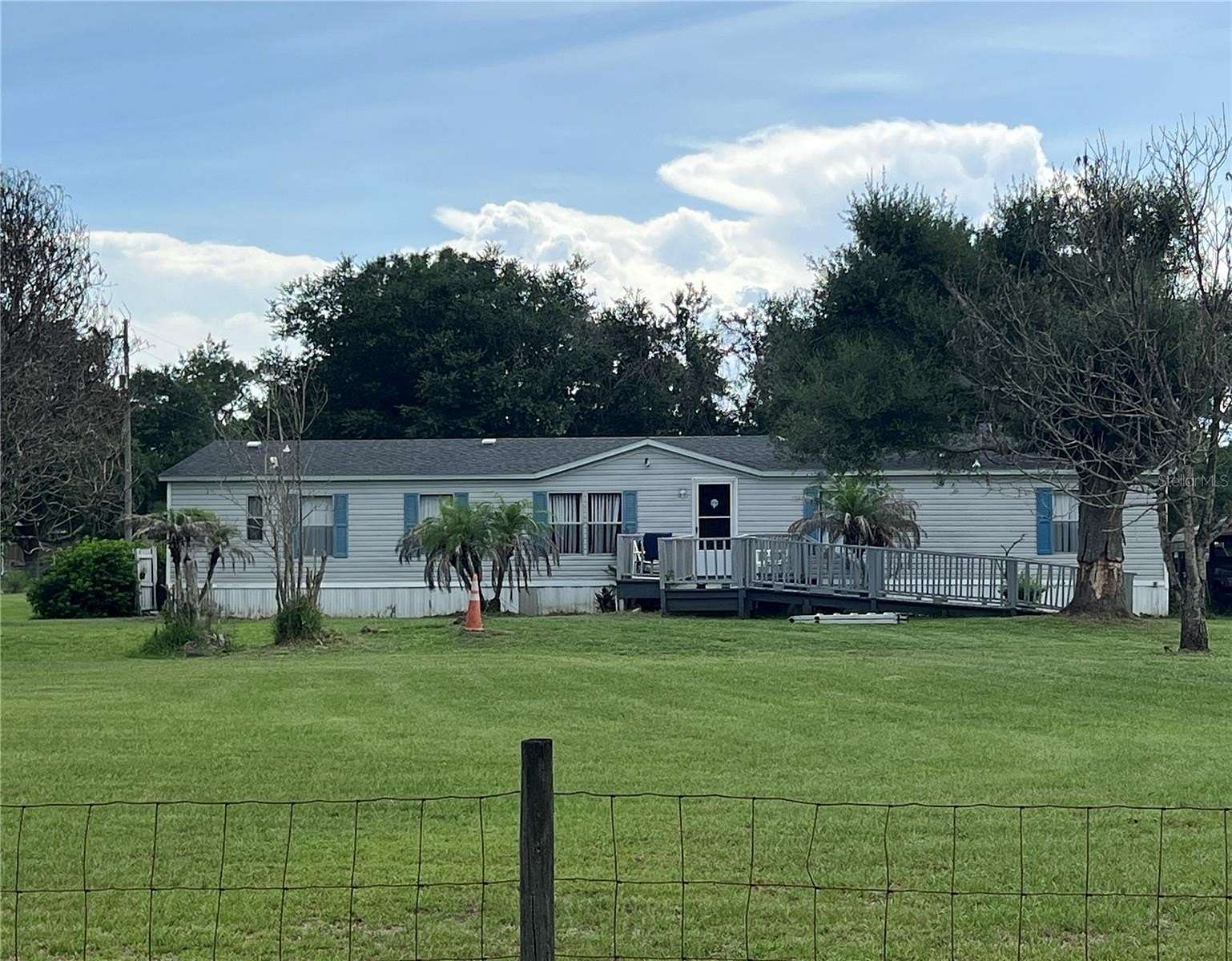 2.42 Acres of Land with Home for Sale in St. Cloud, Florida