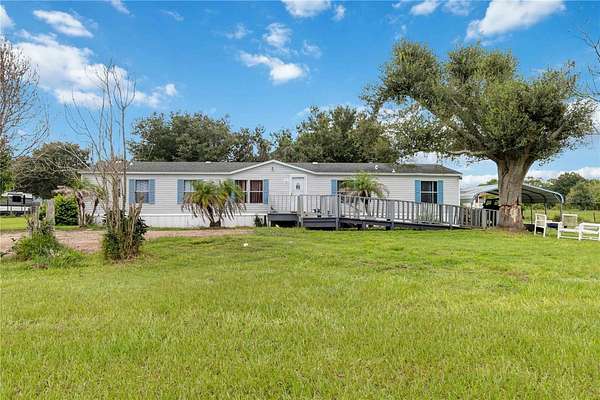 2.42 Acres of Land with Home for Sale in St. Cloud, Florida