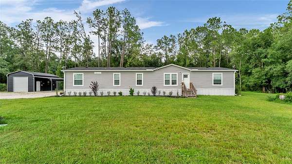 1.7 Acres of Land with Home for Sale in Kathleen, Florida