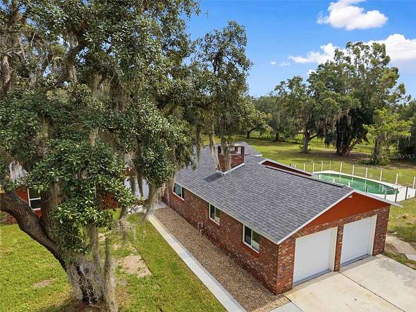 5.53 Acres of Land with Home for Sale in Hudson, Florida