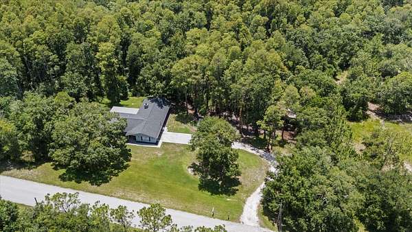 5.69 Acres of Land with Home for Sale in Tarpon Springs, Florida