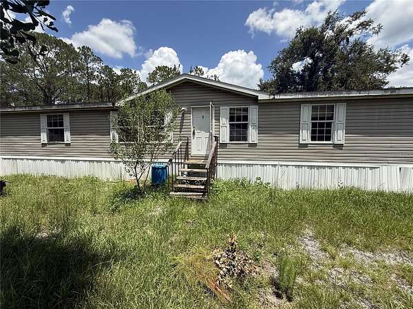 5 Acres of Land with Home for Sale in Lakeland, Florida
