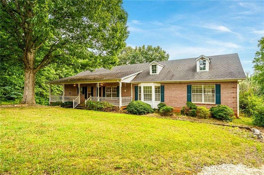 6.14 Acres of Land with Home for Sale in Ball Ground, Georgia