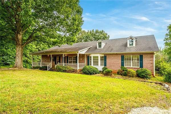 6.14 Acres of Land with Home for Sale in Ball Ground, Georgia