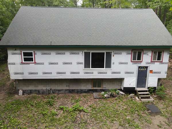1.85 Acres of Land with Home for Sale in Alpena, Michigan