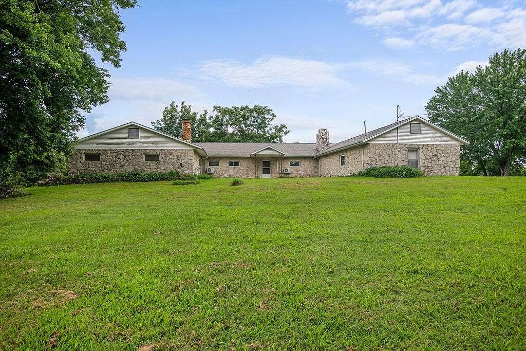42.4 Acres of Land with Home for Sale in Chadwick, Missouri