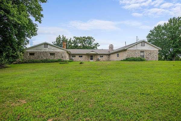 42.4 Acres of Land with Home for Sale in Chadwick, Missouri