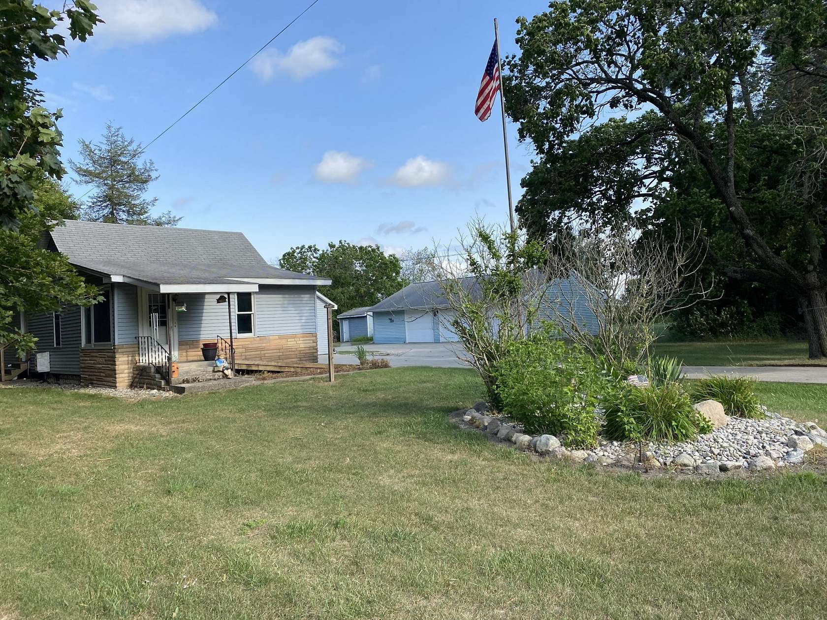 3.64 Acres of Land with Home for Sale in Howard City, Michigan