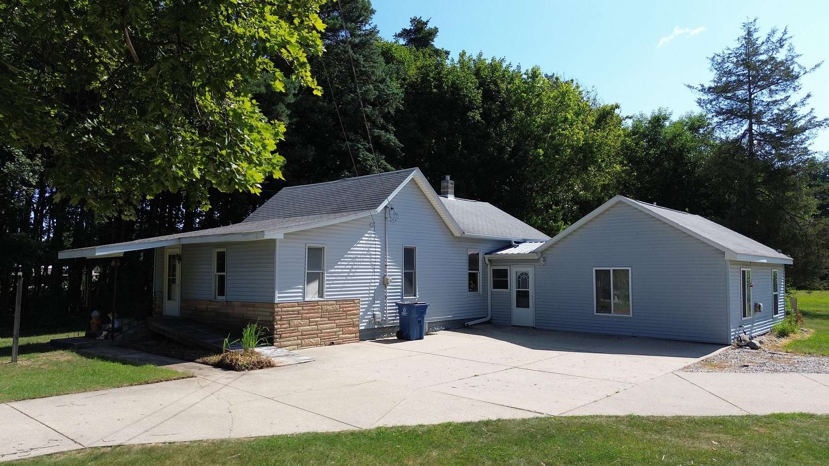 3.64 Acres of Land with Home for Sale in Howard City, Michigan