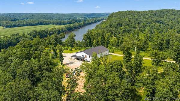 90 Acres of Land with Home for Sale in Tuscumbia, Missouri